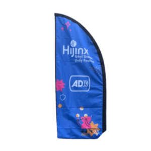 The flag indicating Audio Description. It is blue, long and narrow, with the Hijinx logo and an AD icon on it, as well as some of the Unity Festival illustration branding.